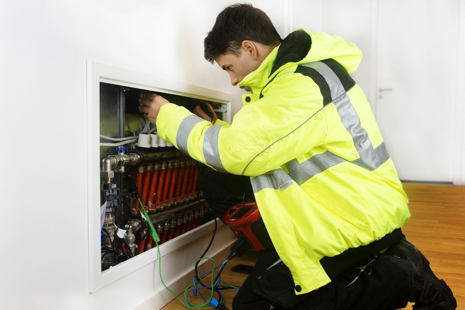 Technician working on a home heating system